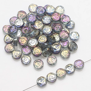 Close-up of 10mm iridescent rose-patterned glass beads for DIY jewelry making and crafts