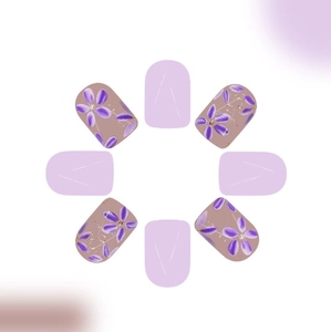Purple flower press-on nails with lavender solid colors and glitter embellishments