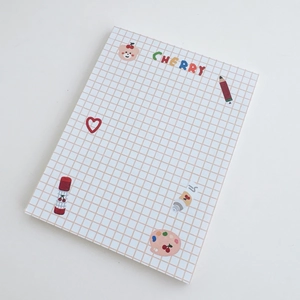 Detail of grid memo pad featuring cute cherry bear illustrations and colorful graphics