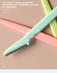 Close-up of stainless steel eyebrow razor head with micro safety mesh guard design