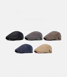 Close-up of adjustable metal side buckles on vintage washed cotton flat caps