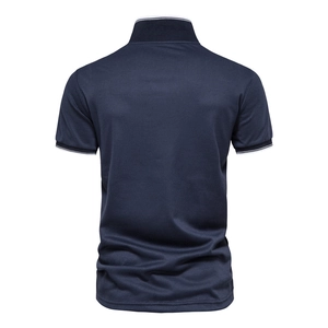Back view of a navy blue cotton polo shirt with white double stripes on sleeves and collar