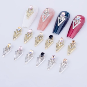 Detailed view of alloy nail charms with water-drop crystals and triangle rhinestones
