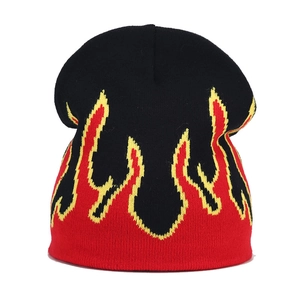 Hip hop style knitted beanie with red and yellow flame jacquard pattern in black