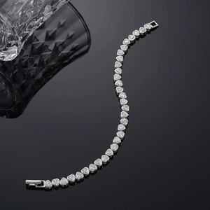 Elegant S925 silver heart tennis bracelet featuring sparkling heart-cut cubic zirconia gems
