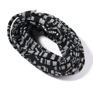 Close-up of 5mm black and white checkered flat woven cord for DIY jewelry making