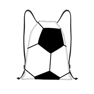Flat lay of soccer pattern drawstring bag with black and white hexagonal design