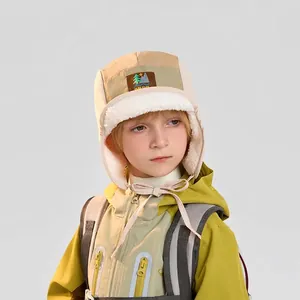 Winter trapper hat for kids with fleece lining and earflaps for outdoor wind protection