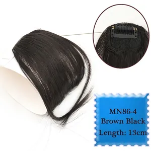 Close-up of 13cm brown black clip-in air bangs with detailed mesh and metal clip