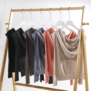 Chic knitted hooded scarf shawl for women in multiple colors on wooden hangers