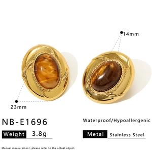 Detailed view of 23x14mm gold stainless steel oval earrings with brown tiger eye stone