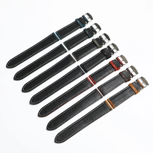 Detail of crazy horse leather watch straps with quick-release bars and multi-color loops