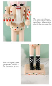 Macro detail of wooden pink gingerbread nutcracker with stable square base design