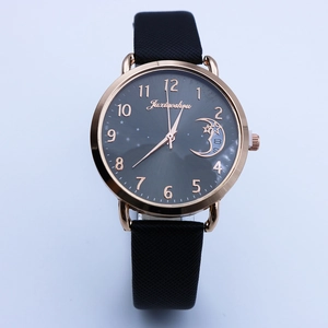 Starry sky themed women's watch with rose gold case, moon and star accents on dark dial