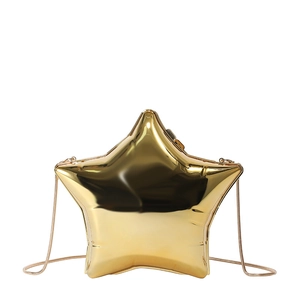 Chic gold star-shaped acrylic mini crossbody bag with metallic finish and chain strap