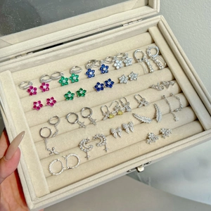 Assorted S925 sterling silver stud earrings with colorful zircon in a velvet jewelry box