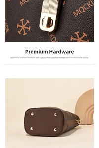 Detail of printed bucket bag with light gold lock and protective bottom metal feet