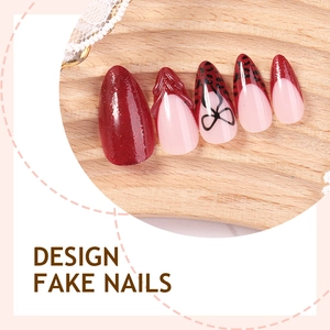 Leopard print almond press-on nails with 3D bows and burgundy glitter finish