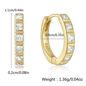 Detail view of S925 sterling silver huggie earrings with square-cut cubic zirconia