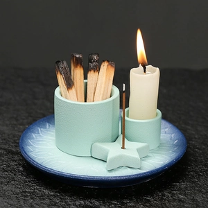 Ceramic incense burner set with blue gradient tray and light green candle holder