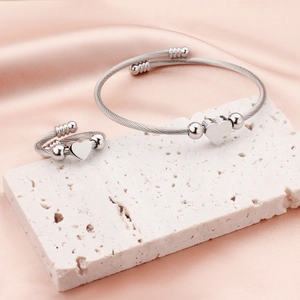 Silver stainless steel heart jewelry set with woven cable bracelet and matching heart ring