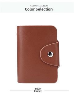 Detailed view of brown lychee grain leather card holder with silver metal snap button