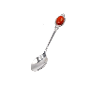 Elegant silver spoon with red agate crystal handle for creative gifting and stirring
