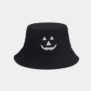 Detail of Jack-o'-lantern face print on black cotton bucket hat for Halloween style
