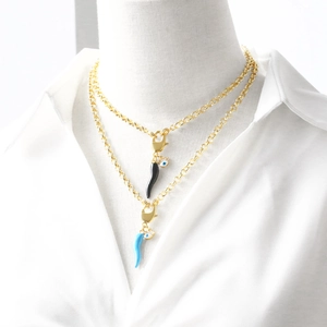 18k gold plated chunky chain necklace with black and blue enamel horn pendants and evil eye