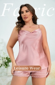 Detail showing the silky satin fabric texture and cowl neck design on pink plus size pajamas