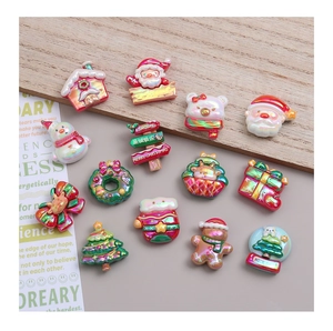 Macro shot of 14 colorful aurora-coated resin Christmas DIY charms with laser finish
