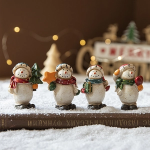 Set of 4 painted resin snowman figurines for Christmas tabletop decor and scene layouts