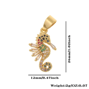 Detailed size view of gold seahorse pendant with colorful zircons measuring 26x12mm