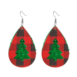 Detail of teardrop leather earrings with red black plaid and green glitter Christmas tree