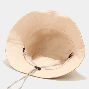 Minimalist beige foldable wide brim bucket hat with adjustable detachable windproof rope