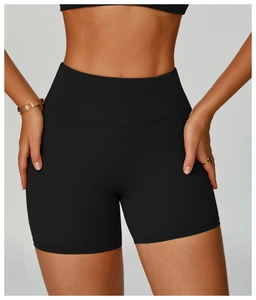 Close-up of high-waisted black yoga shorts with premium stitching and elastic fabric