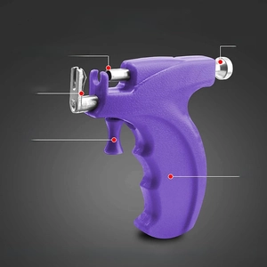Purple stainless steel ear piercing tool with component labels and operation tips