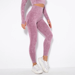 Detail of mauve washed seamless yoga set with thumb holes and ribbed side texture