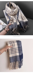 Detail showing the lilac plaid cashmere-like scarf texture with elegant fringe tassels