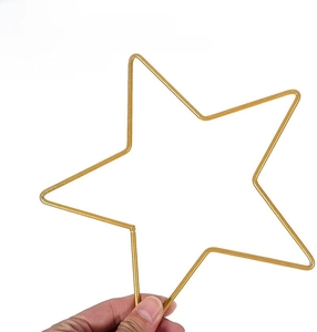 Close-up of a durable gold star-shaped metal ring for DIY dream catcher making