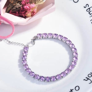 Luxurious tennis bracelet featuring lavender purple cubic zirconia with four-prong settings