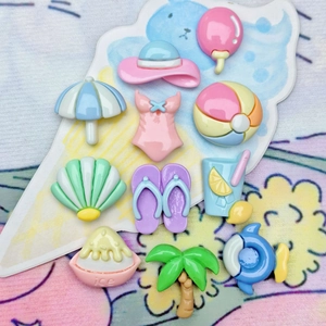 Assorted summer beach resin charms including swimsuit, sun hat and tropical tree