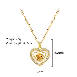 Detailed view of heart pendant necklace with dimensions 2.3cm x 2cm and technical specs