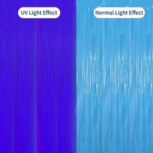 Fluorescent foil fringe curtain showing UV light purple effect vs normal blue effect