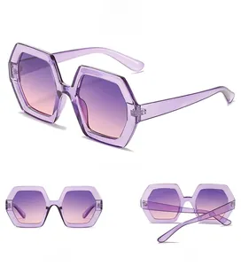 Three-angle view of oversized purple hexagonal sunglasses with gradient lenses