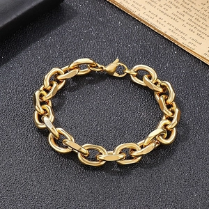 Polished gold flat cut cable chain bracelet for men with lobster clasp on black background