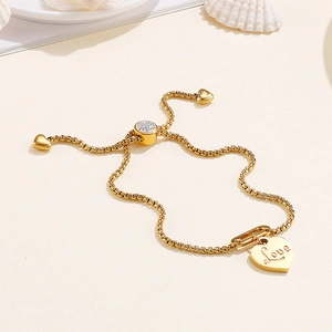 Adjustable gold heart charm bracelet with Love engraving and crystal slider box chain