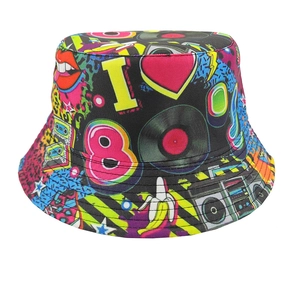 Detail of a black bucket hat featuring retro 80s graffiti prints and pop art elements