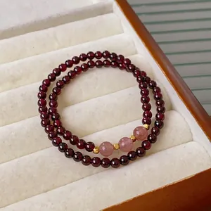 Double-layer garnet and strawberry quartz beaded bracelet with gold metal spacers