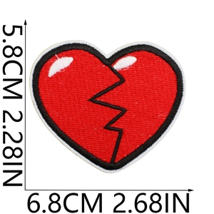 Detail view of red broken heart embroidered patch showing texture and 6.8x5.8cm size